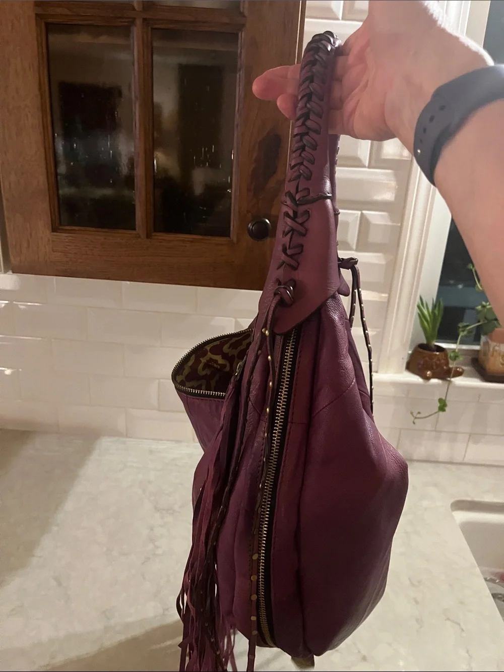 orYANY purple Studded  fringed Leather Hobo Bag with geometric interior material